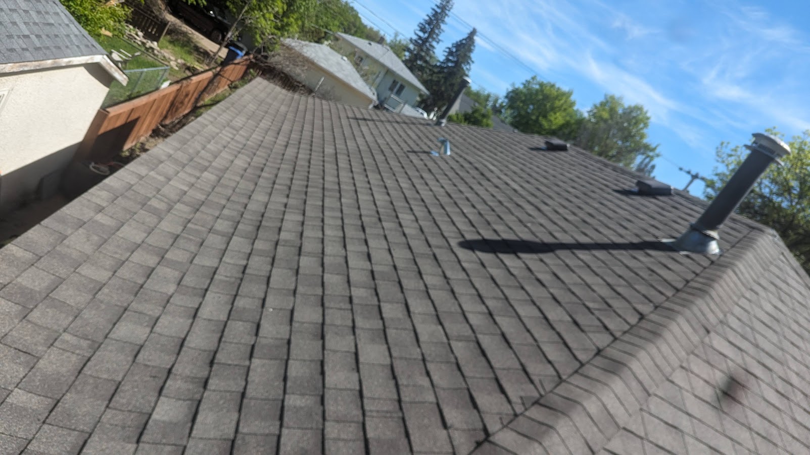 Completed asphalt shingle roof replacement on Belfast Street