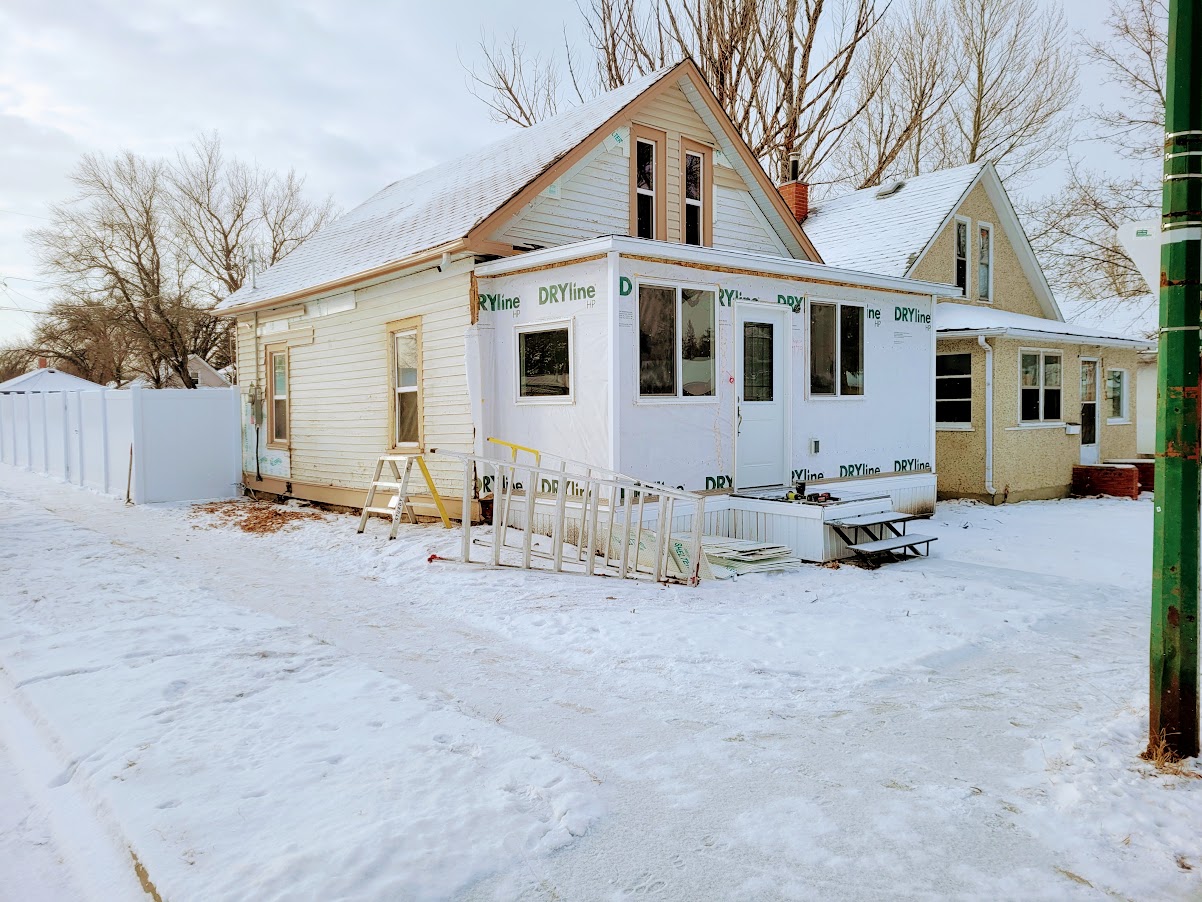 Minto Avenue home during an exterior renovation in winter